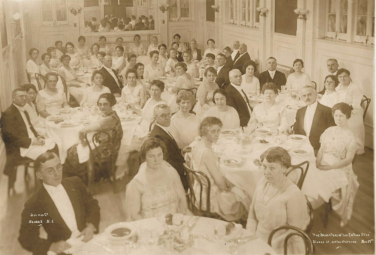 The Daughter's of the Eastern Star Dinner
My grand aunt: Nellie M Cook (b. 1897) is seated towards the left side and wearing a grey/blackish dress.
Photo from James Cook Embree, Jr.
